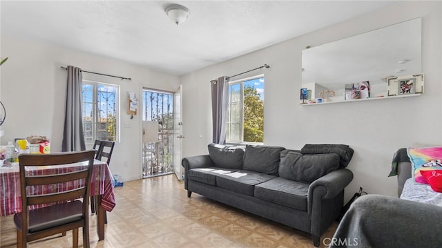 413 E 81st St, Los Angeles, CA 90003 - living area with healthy amount of natural light and light floors
