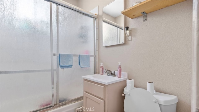 413 E 81st St, Los Angeles, CA 90003 - full bathroom featuring a shower with door, toilet, vanity, and a textured wall