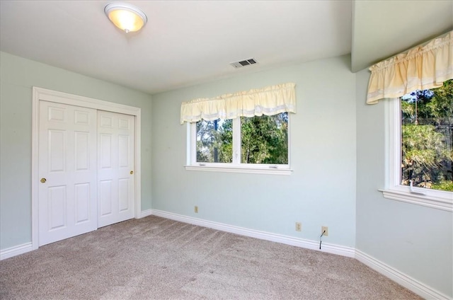 455 Chiswick Way, Cambria, CA 93428 - unfurnished bedroom featuring carpet flooring, a closet, and baseboards