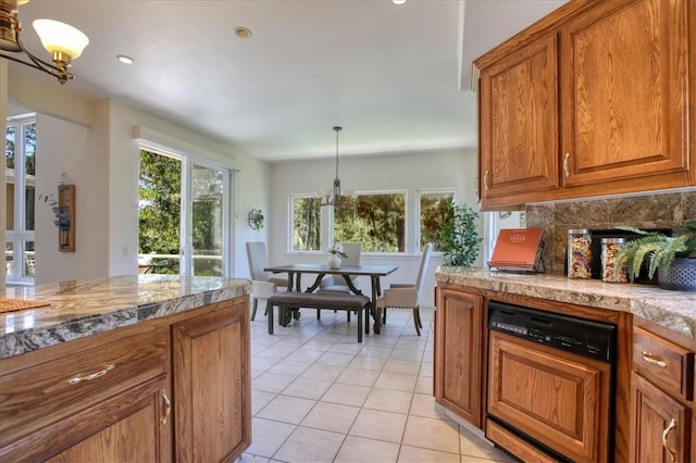 455 Chiswick Way, Cambria, CA 93428 - kitchen featuring a chandelier, dishwasher, brown cabinets, light tile patterned floors, and recessed lighting