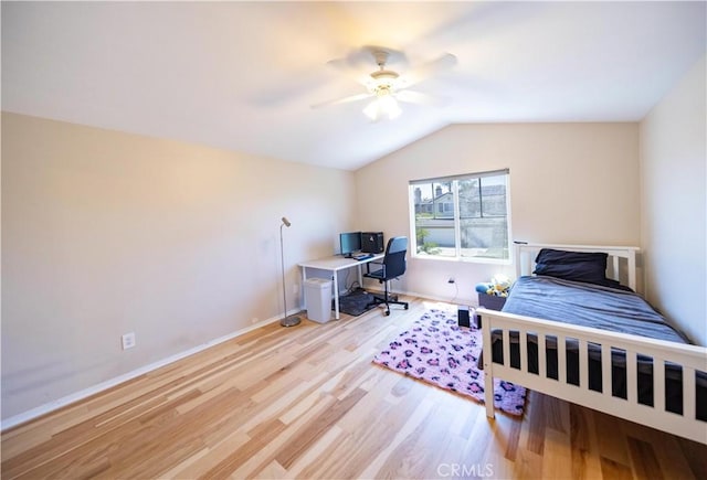 30802 Terrace View Cir, Temecula, CA 92591 - bedroom with light wood-style floors, vaulted ceiling, an office area, a ceiling fan, and baseboards