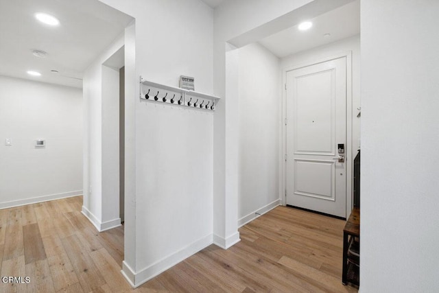 2800 Wagon Wheel Rd Unit 304, Oxnard, CA 93036 - hall featuring light wood-style flooring, baseboards, and recessed lighting