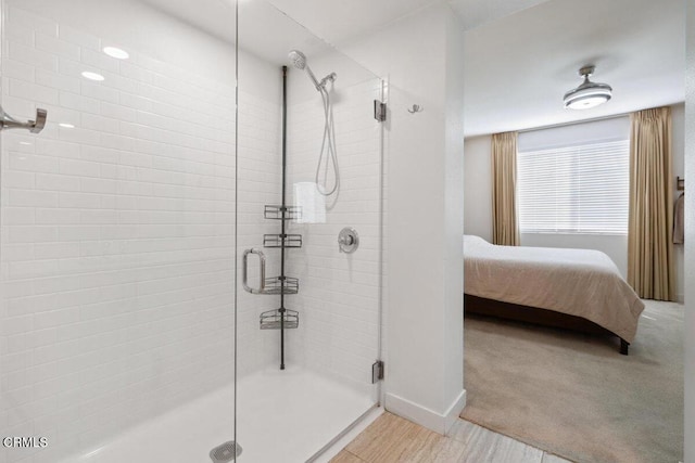 2800 Wagon Wheel Rd Unit 304, Oxnard, CA 93036 - ensuite bathroom with a shower stall and baseboards