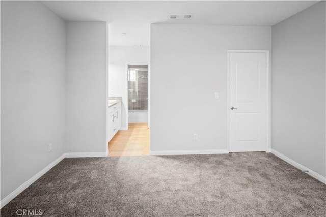 4617 Alekona Ct, Cypress, CA 90630 - unfurnished bedroom featuring light carpet and ensuite bath
