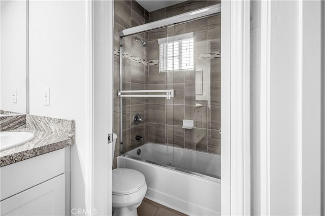 4617 Alekona Ct, Cypress, CA 90630 - full bathroom featuring vanity, bath / shower combo with glass door, and tile patterned floors