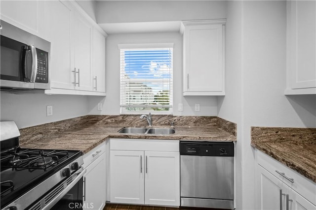 4617 Alekona Ct, Cypress, CA 90630 - kitchen featuring stainless steel appliances, white cabinets, and dark stone countertops