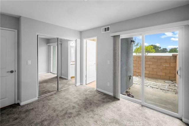 4617 Alekona Ct, Cypress, CA 90630 - unfurnished bedroom featuring access to exterior, carpet flooring, and a closet