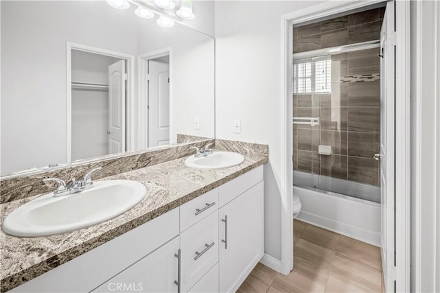4617 Alekona Ct, Cypress, CA 90630 - bathroom featuring double vanity and combined bath / shower with glass door