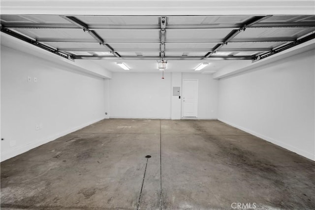 4615 Alekona Ct, Cypress, CA 90630 - garage with baseboards and a garage door opener