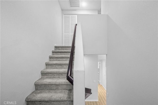 4615 Alekona Ct, Cypress, CA 90630 - staircase featuring wood finished floors