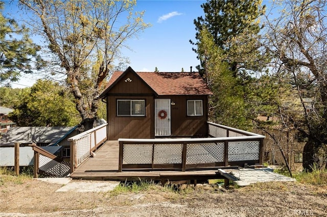 32930 Rim Of The World, Running Springs, CA 92382 - view of front of home with a deck and roof with shingles