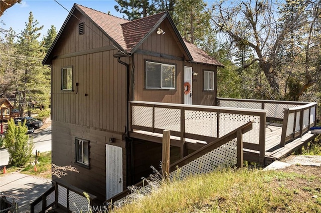 32930 Rim Of The World, Running Springs, CA 92382 - view of side of property featuring roof with shingles and a wooden deck