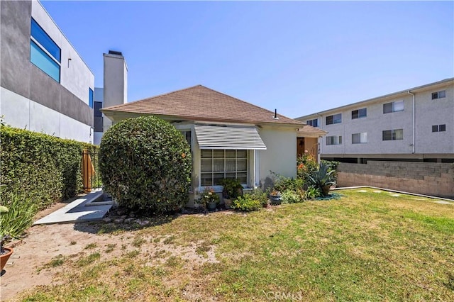 4180 Tujunga Ave, Studio City, CA 91604 - back of house featuring stucco siding and a chimney