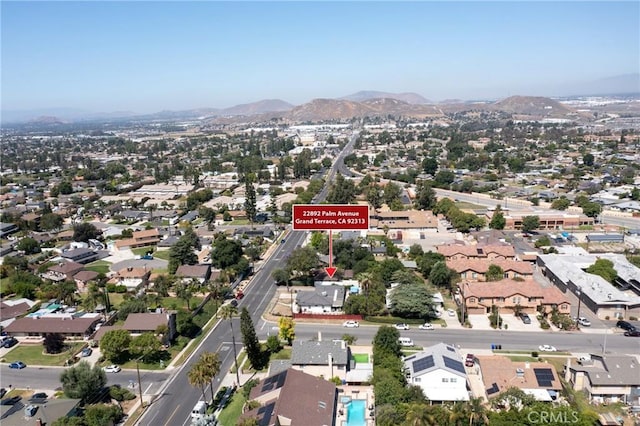 22892 Palm Ave, Grand Terrace, CA 92313 - aerial view of property and surrounding area with a mountain backdrop and nearby suburban area