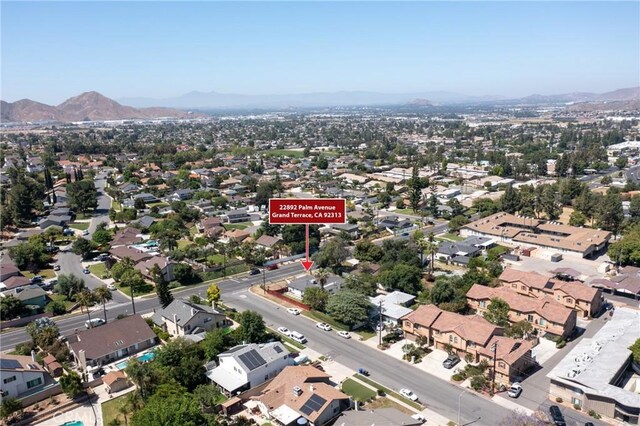 22892 Palm Ave, Grand Terrace, CA 92313 - aerial view of property's location with a mountainous background and nearby suburban area