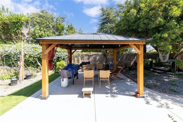 22892 Palm Ave, Grand Terrace, CA 92313 - fenced backyard with outdoor dining area, a gazebo, and a patio area