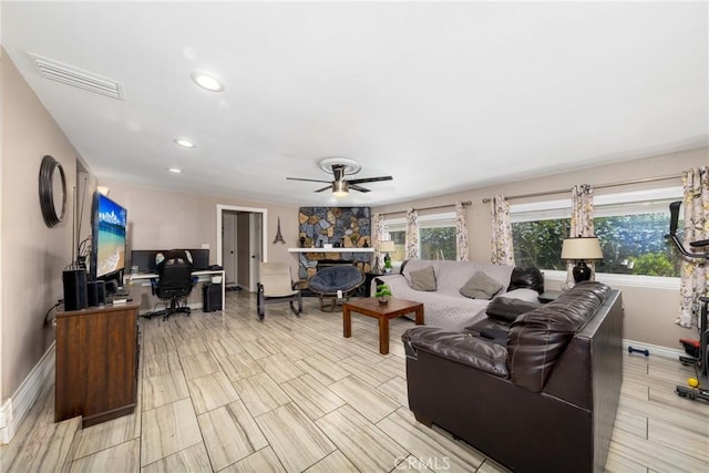 22892 Palm Ave, Grand Terrace, CA 92313 - living area featuring a desk, baseboards, ceiling fan, recessed lighting, and a fireplace