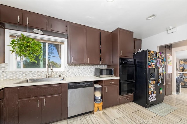 22892 Palm Ave, Grand Terrace, CA 92313 - kitchen with black appliances, a sink, light countertops, backsplash, and dark brown cabinetry