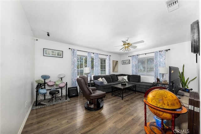 22892 Palm Ave, Grand Terrace, CA 92313 - living area featuring wood finished floors, a ceiling fan, and baseboards