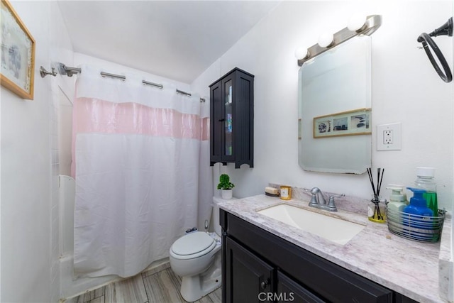 22892 Palm Ave, Grand Terrace, CA 92313 - bathroom featuring toilet, vanity, and shower / tub combo
