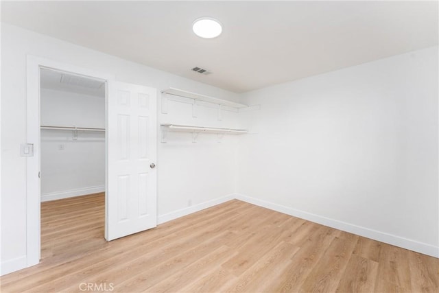 1089 W 2nd St, Rialto, CA 92376 - walk in closet featuring light wood finished floors