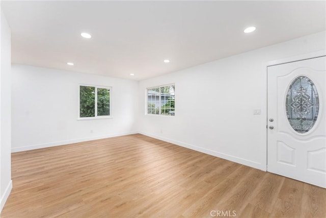 1089 W 2nd St, Rialto, CA 92376 - entrance foyer with light wood finished floors, recessed lighting, and baseboards