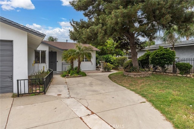 1089 W 2nd St, Rialto, CA 92376 - view of front of house featuring stucco siding