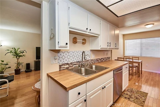 928 N Redding Way Unit D, Upland, CA 91786 - kitchen with a sink, wood counters, stainless steel dishwasher, and light wood-type flooring