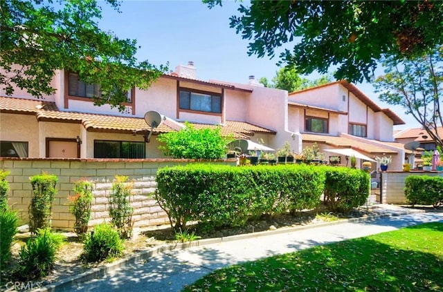 928 N Redding Way Unit D, Upland, CA 91786 - view of front of property with stucco siding and a chimney