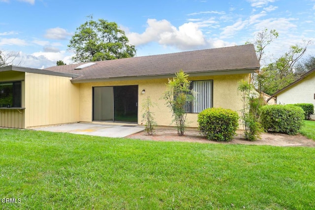 41019 Village 41, Camarillo, CA 93012 - back of house with a lawn, a patio area, stucco siding, and a shingled roof