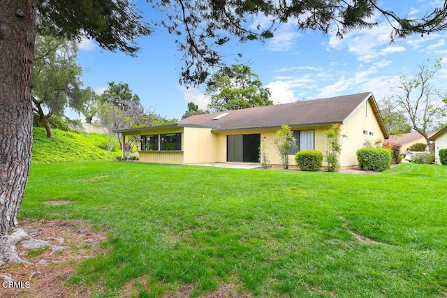 41019 Village 41, Camarillo, CA 93012 - rear view of house with a lawn