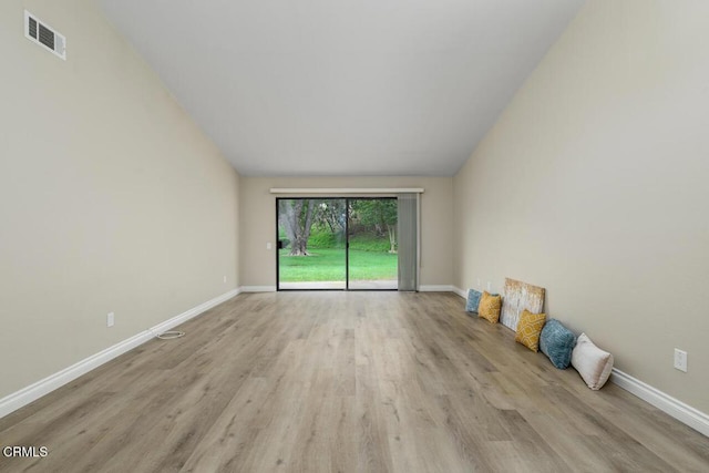 41019 Village 41, Camarillo, CA 93012 - empty room featuring wood finished floors, baseboards, and lofted ceiling