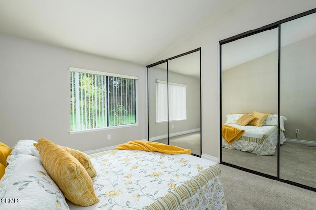 41019 Village 41, Camarillo, CA 93012 - carpeted bedroom with two closets, lofted ceiling, and baseboards