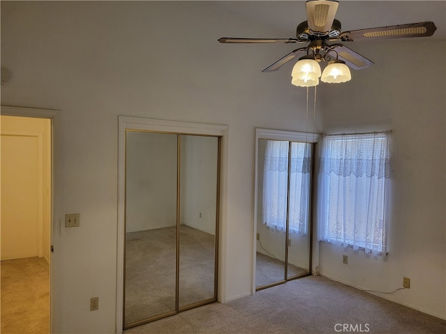 2368 Beechwood Way, Madera, CA 93637 - unfurnished bedroom featuring carpet, multiple closets, and ceiling fan