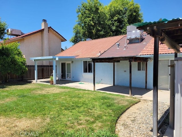 2368 Beechwood Way, Madera, CA 93637 - rear view of house with a patio, a tiled roof, and stucco siding