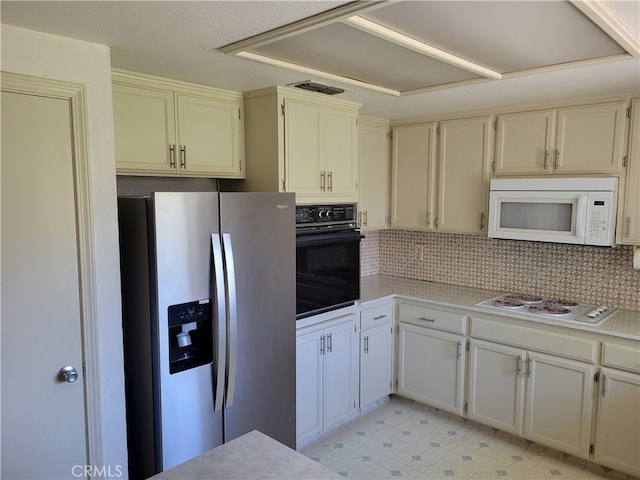 2368 Beechwood Way, Madera, CA 93637 - kitchen with white appliances, decorative backsplash, light countertops, and light flooring