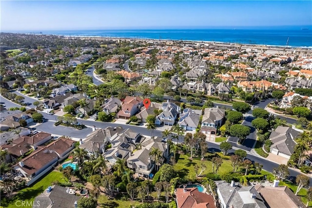 19371 Woodlands Dr, Huntington Beach, CA 92648 - aerial view of property's location with nearby suburban area and a large body of water