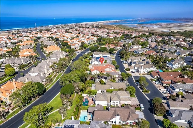 19371 Woodlands Dr, Huntington Beach, CA 92648 - aerial overview of property's location featuring nearby suburban area and a nearby body of water