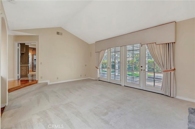 19371 Woodlands Dr, Huntington Beach, CA 92648 - carpeted empty room with baseboards and vaulted ceiling