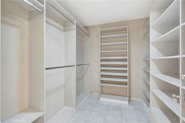 19371 Woodlands Dr, Huntington Beach, CA 92648 - spacious closet featuring tile patterned floors