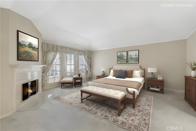 19371 Woodlands Dr, Huntington Beach, CA 92648 - bedroom featuring access to exterior, lofted ceiling, a high end fireplace, baseboards, and ornamental molding