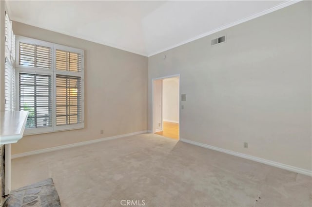 19371 Woodlands Dr, Huntington Beach, CA 92648 - unfurnished room with carpet flooring, baseboards, ornamental molding, and lofted ceiling