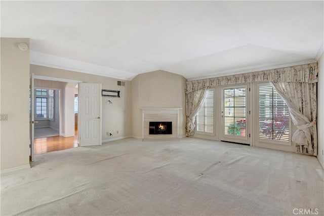 19371 Woodlands Dr, Huntington Beach, CA 92648 - unfurnished living room with carpet, lofted ceiling, a lit fireplace, and baseboards