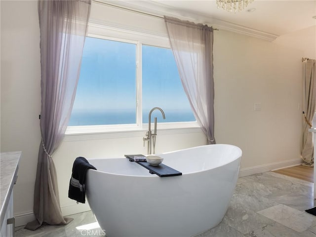 3504 Hightide Dr, Rancho Palos Verdes, CA 90275 - bathroom with a soaking tub, baseboards, marble finish floors, vanity, and crown molding