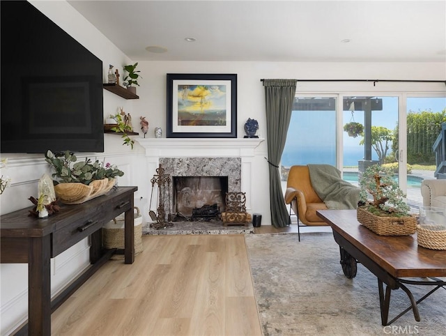 3504 Hightide Dr, Rancho Palos Verdes, CA 90275 - living area featuring light wood-style floors and a fireplace
