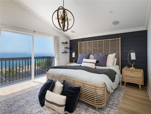 3504 Hightide Dr, Rancho Palos Verdes, CA 90275 - bedroom featuring vaulted ceiling, ornamental molding, access to exterior, wood finished floors, and a chandelier