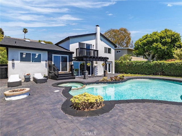 3504 Hightide Dr, Rancho Palos Verdes, CA 90275 - view of swimming pool featuring a patio, a fire pit, and a pool with connected hot tub