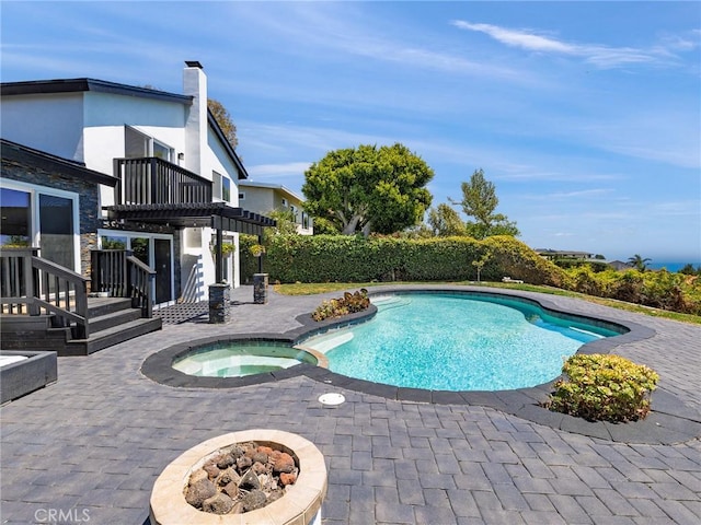 3504 Hightide Dr, Rancho Palos Verdes, CA 90275 - view of pool with a patio area, a pool with connected hot tub, and an outdoor fire pit