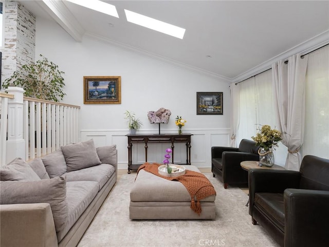 3504 Hightide Dr, Rancho Palos Verdes, CA 90275 - living room featuring a skylight, a decorative wall, a wainscoted wall, and ornamental molding