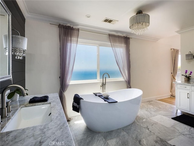 3504 Hightide Dr, Rancho Palos Verdes, CA 90275 - full bathroom featuring ornamental molding, vanity, marble finish flooring, a freestanding tub, and baseboards